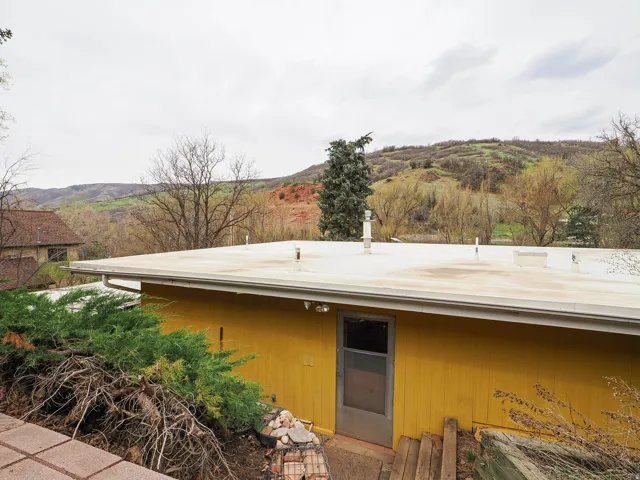 Property entrance featuring a mountain view