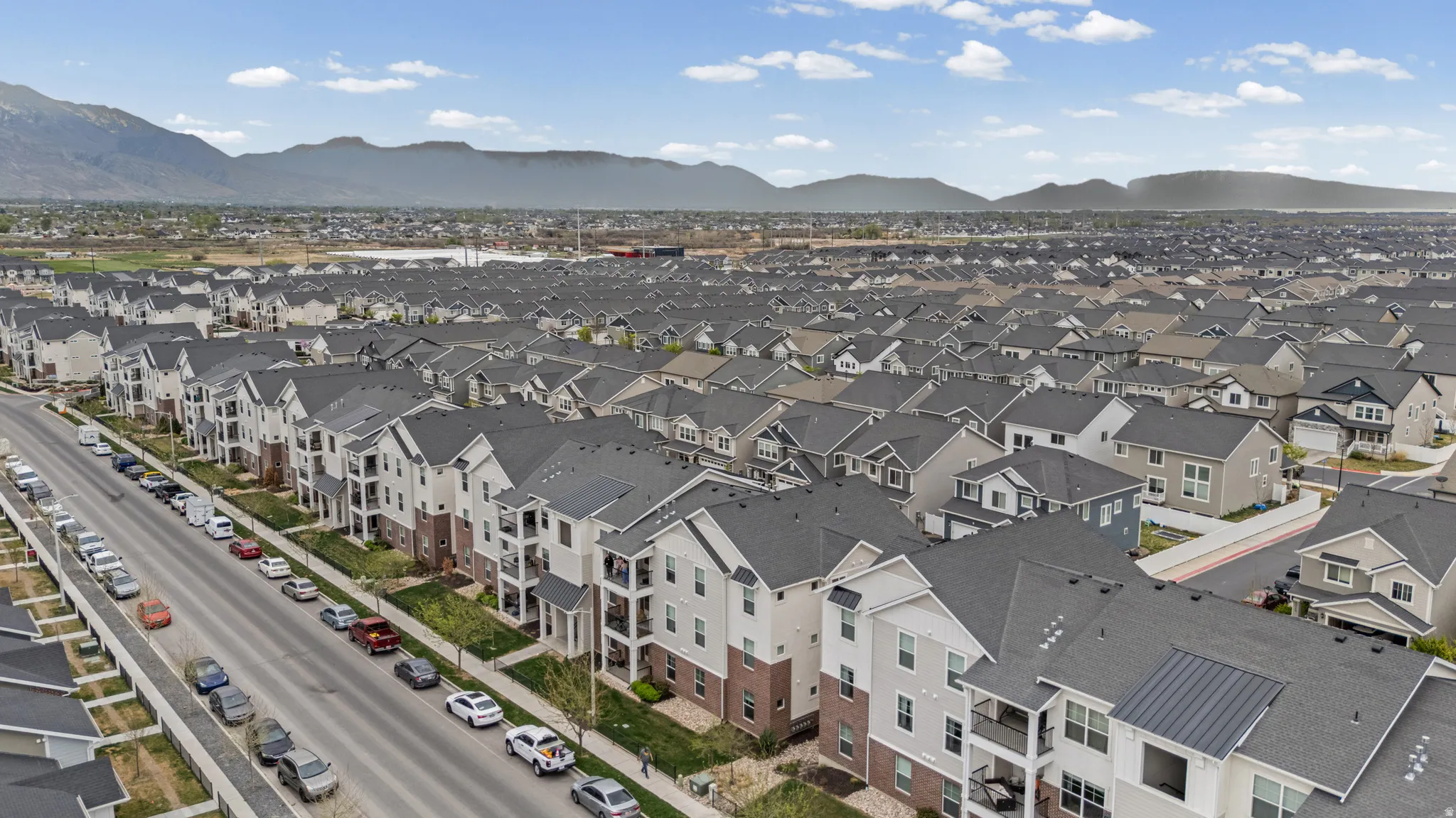 Aerial view of residential area with mountains