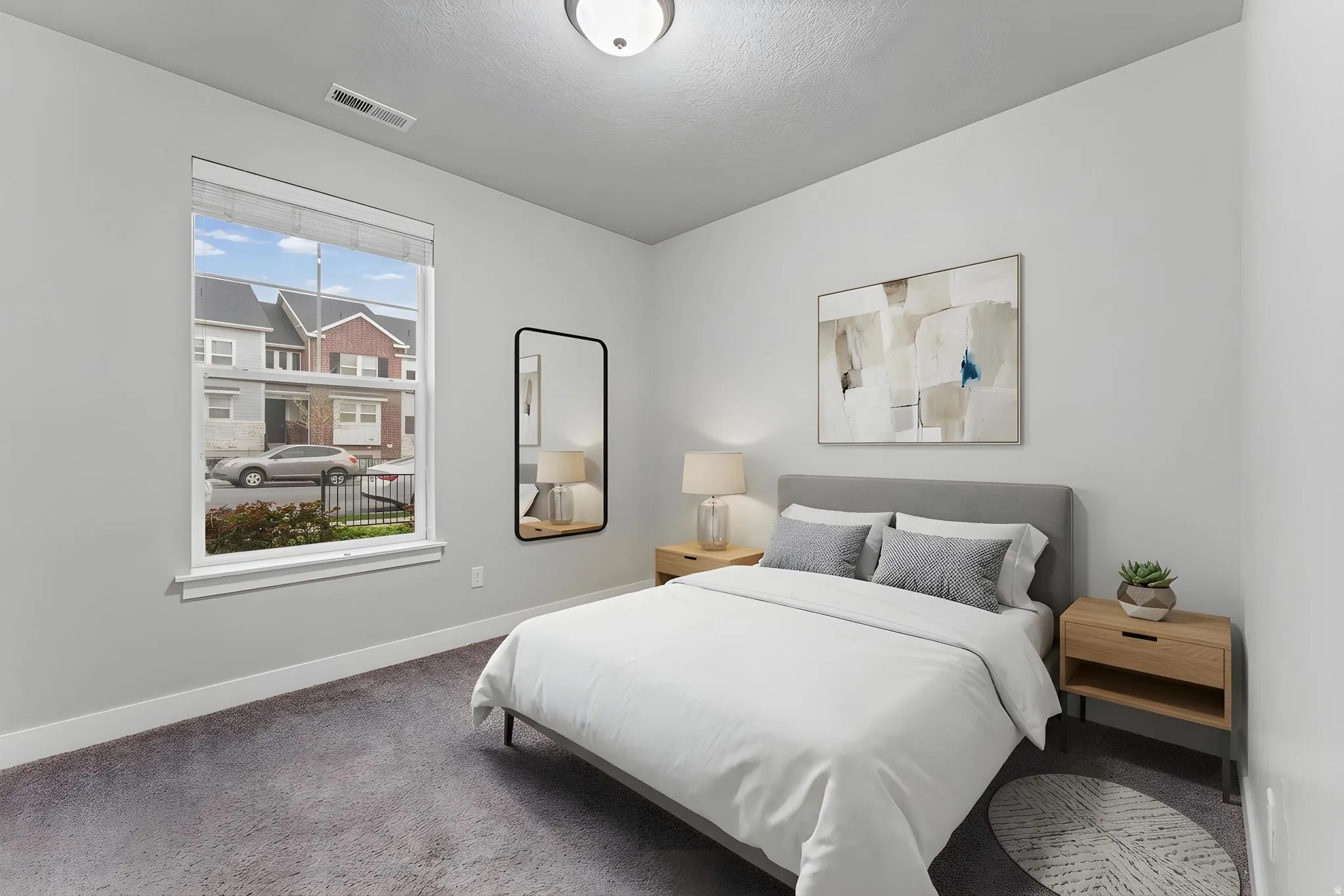 Carpeted bedroom with baseboards