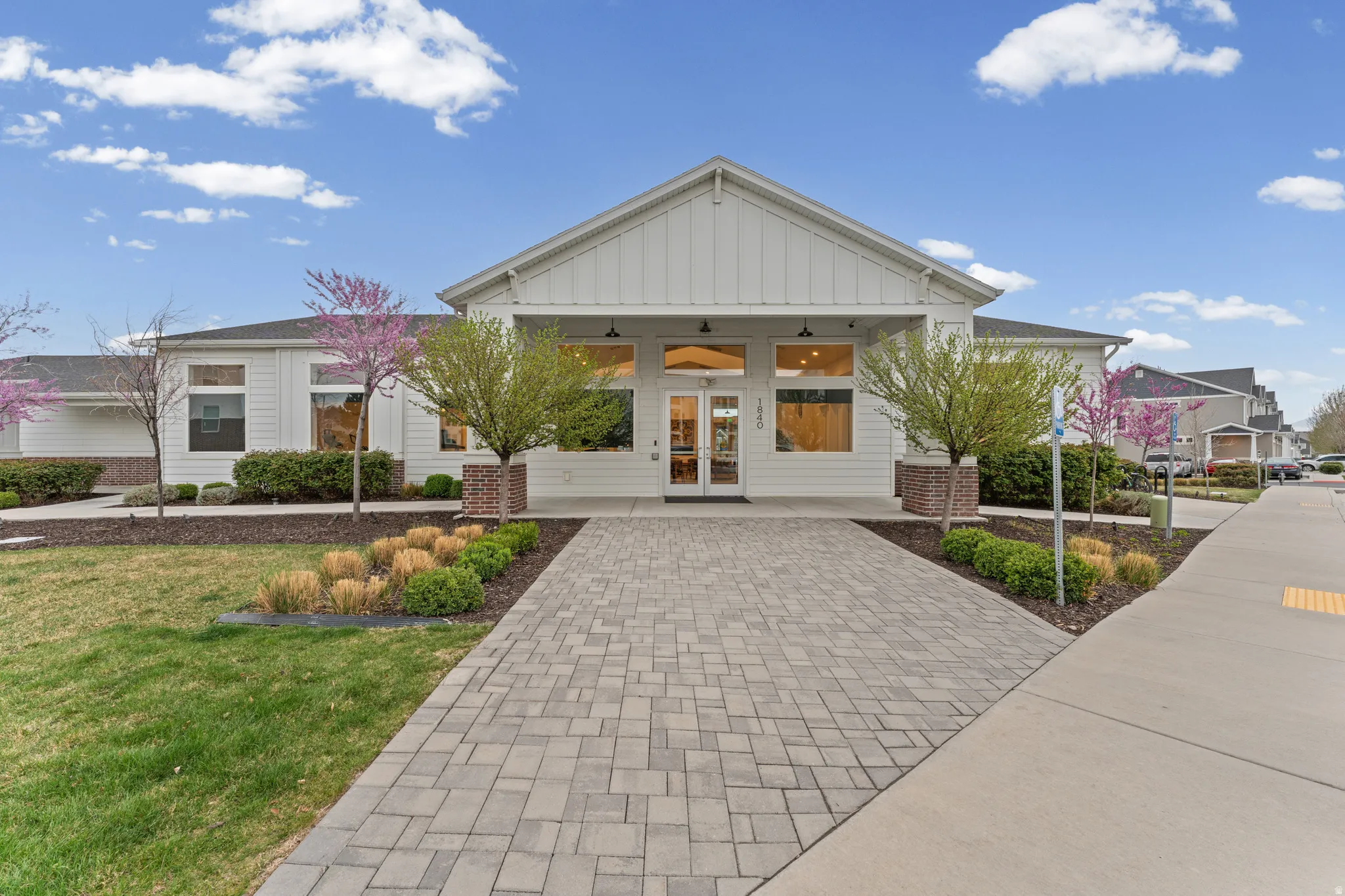 View of property featuring driveway