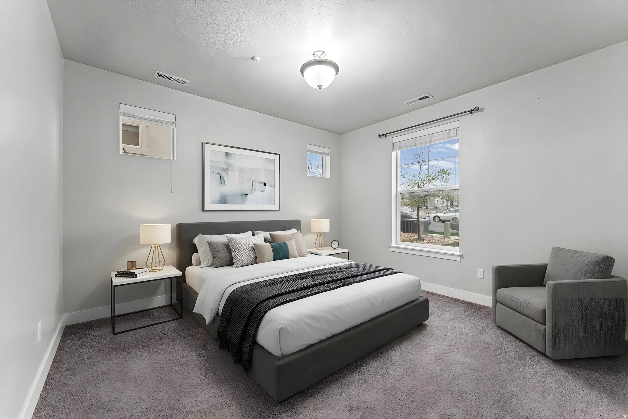 Bedroom featuring baseboards and carpet