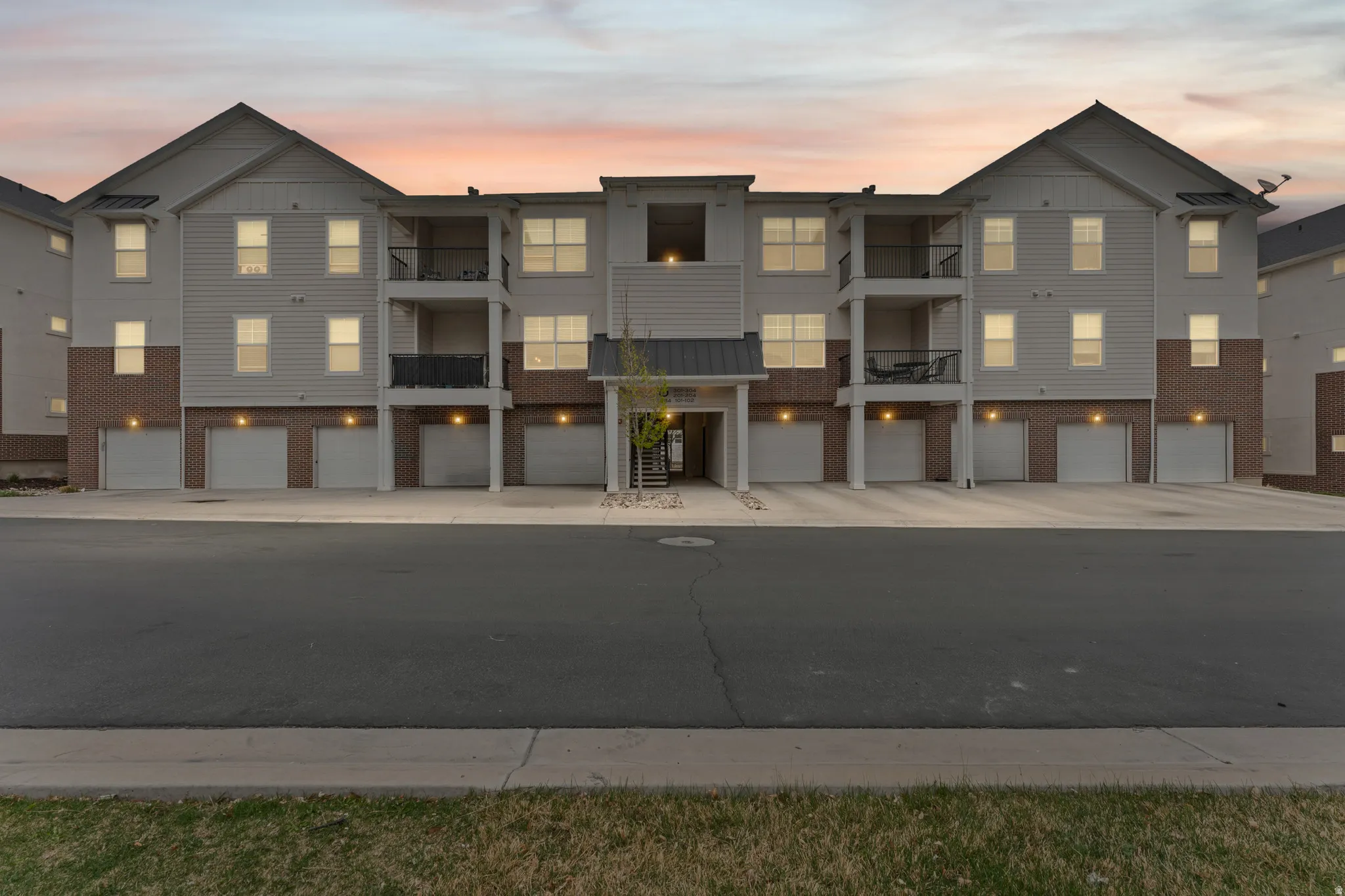 View of building exterior featuring a garage