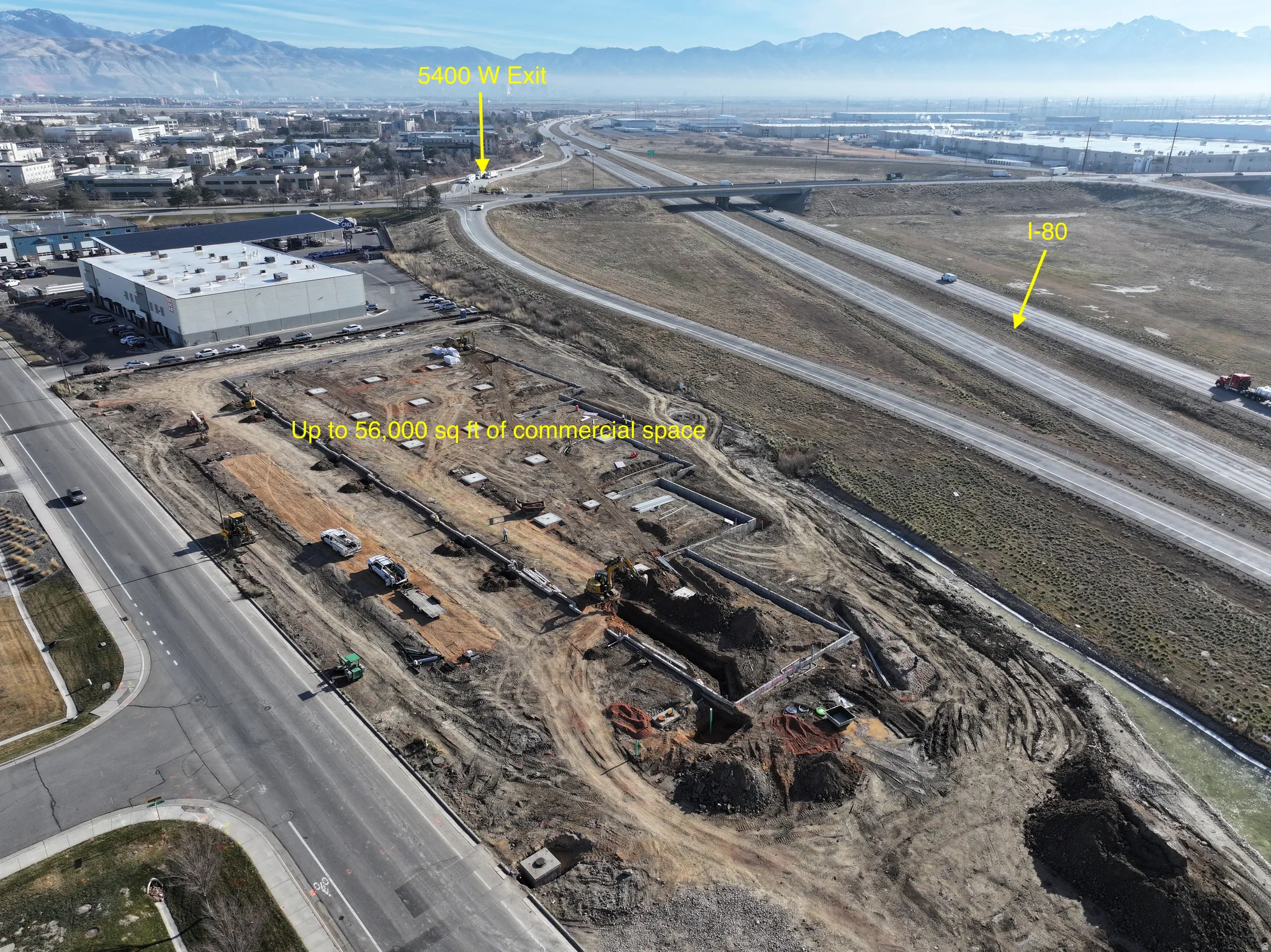 Bird's eye view of an industrial area and mountains