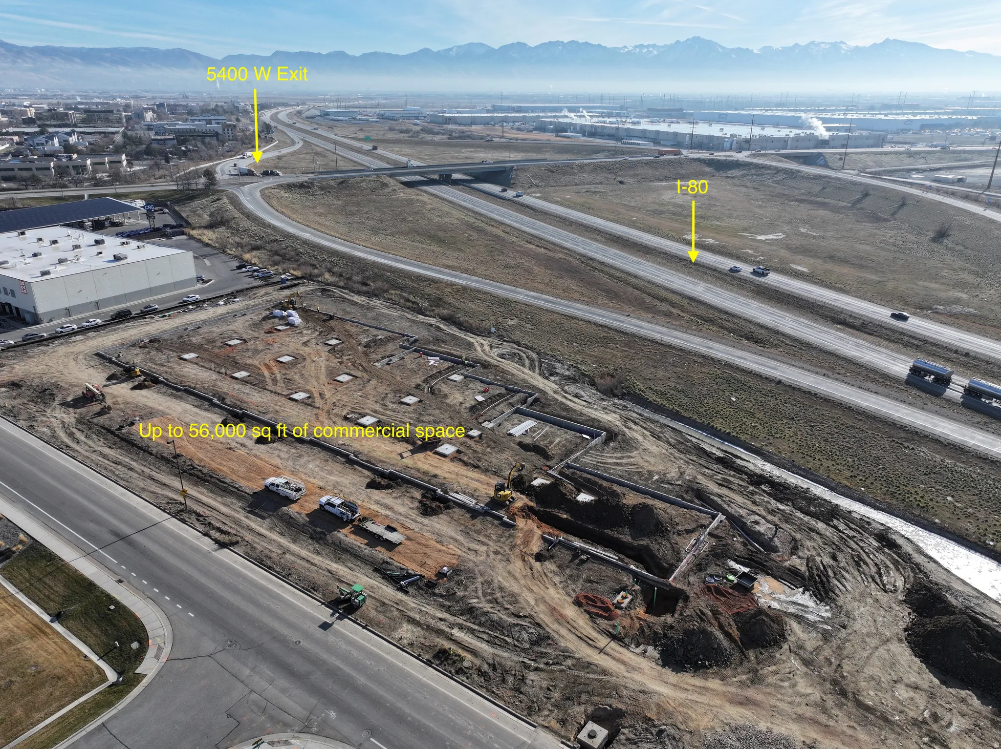 Aerial view of an industrial area and mountains