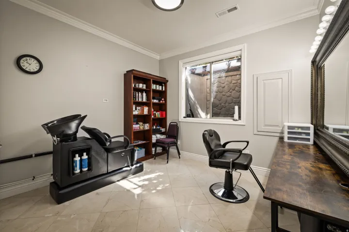 Sitting room featuring crown molding