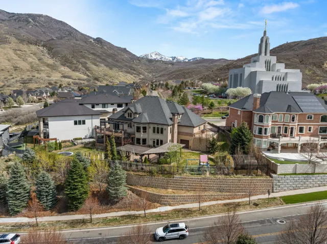 Aerial perspective of suburban area with a mountain backdrop