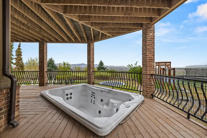 Wooden deck featuring a mountain view
