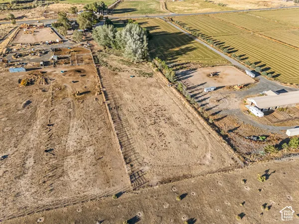 Aerial view of property's location featuring rural landscape and rows of crops