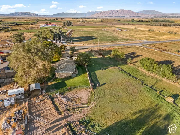 Aerial view of sparsely populated area featuring a mountain backdrop