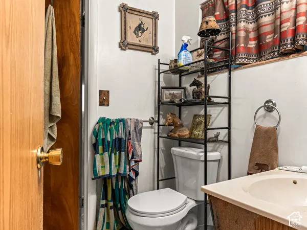 Bathroom with toilet and vanity