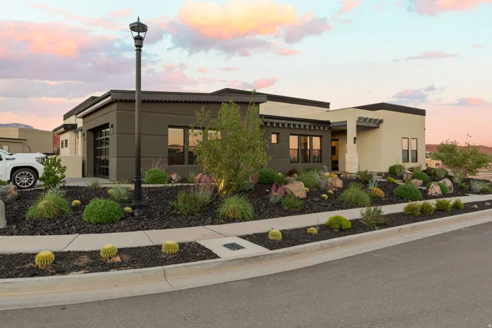 View of front of house with stucco siding