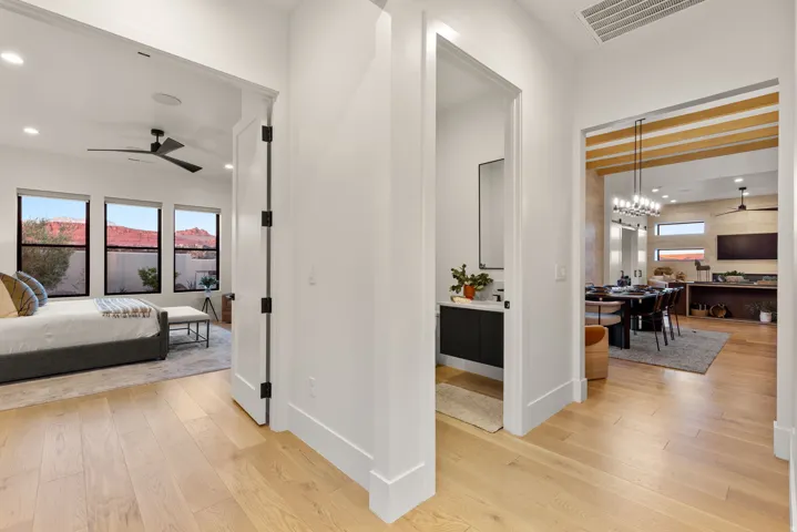 Hall with recessed lighting, light wood-style flooring, and plenty of natural light