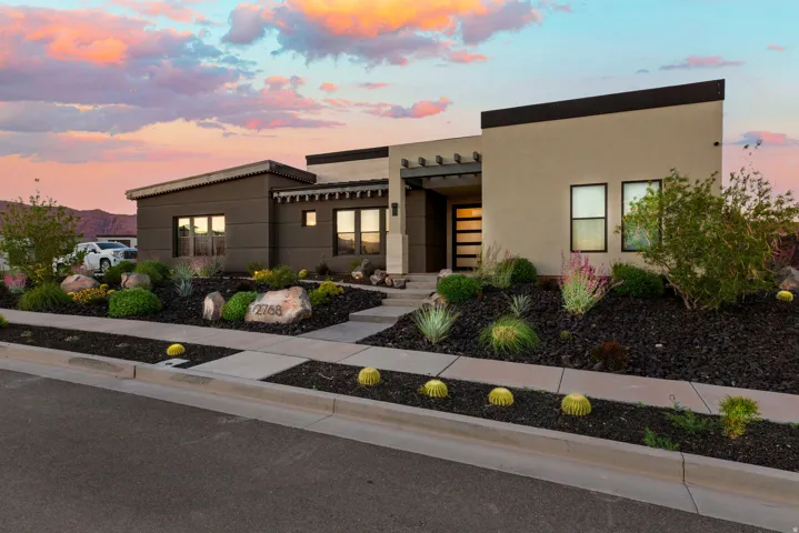 Contemporary house featuring stucco siding