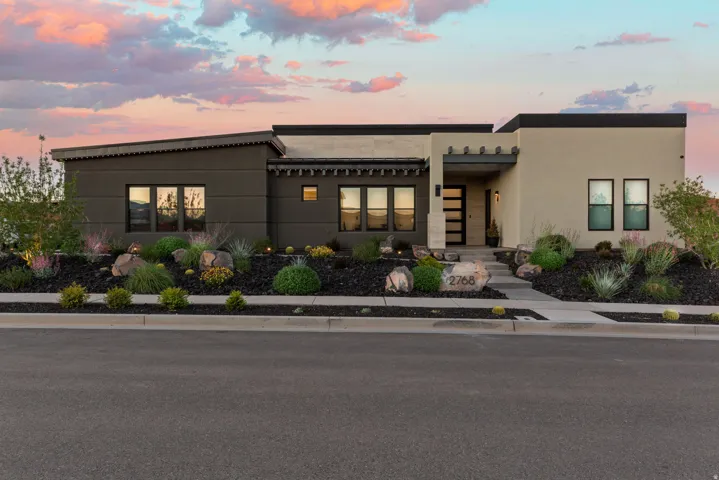 View of front of property featuring stucco siding