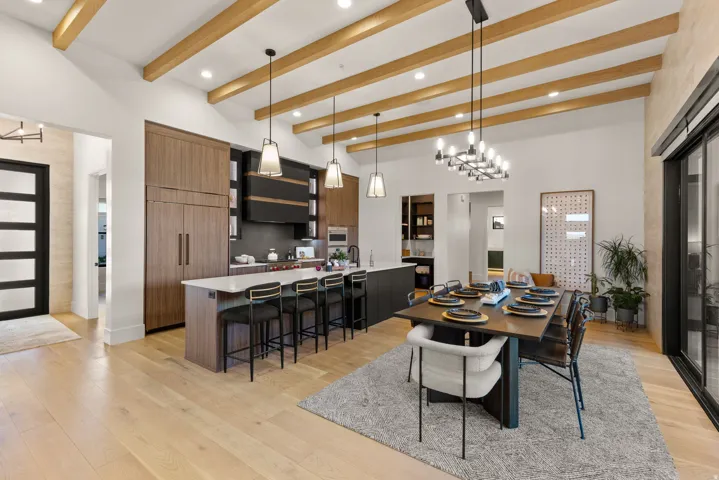 Dining space featuring light wood-style flooring and a chandelier