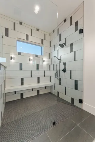 Full bathroom with a tile shower