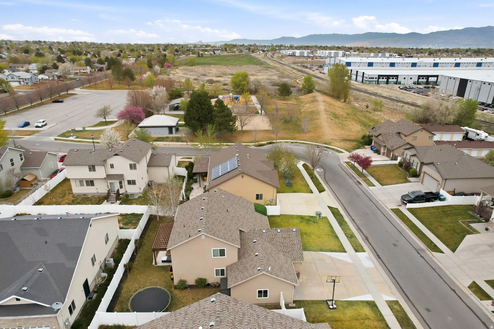 Aerial view of residential area with a mountainous background