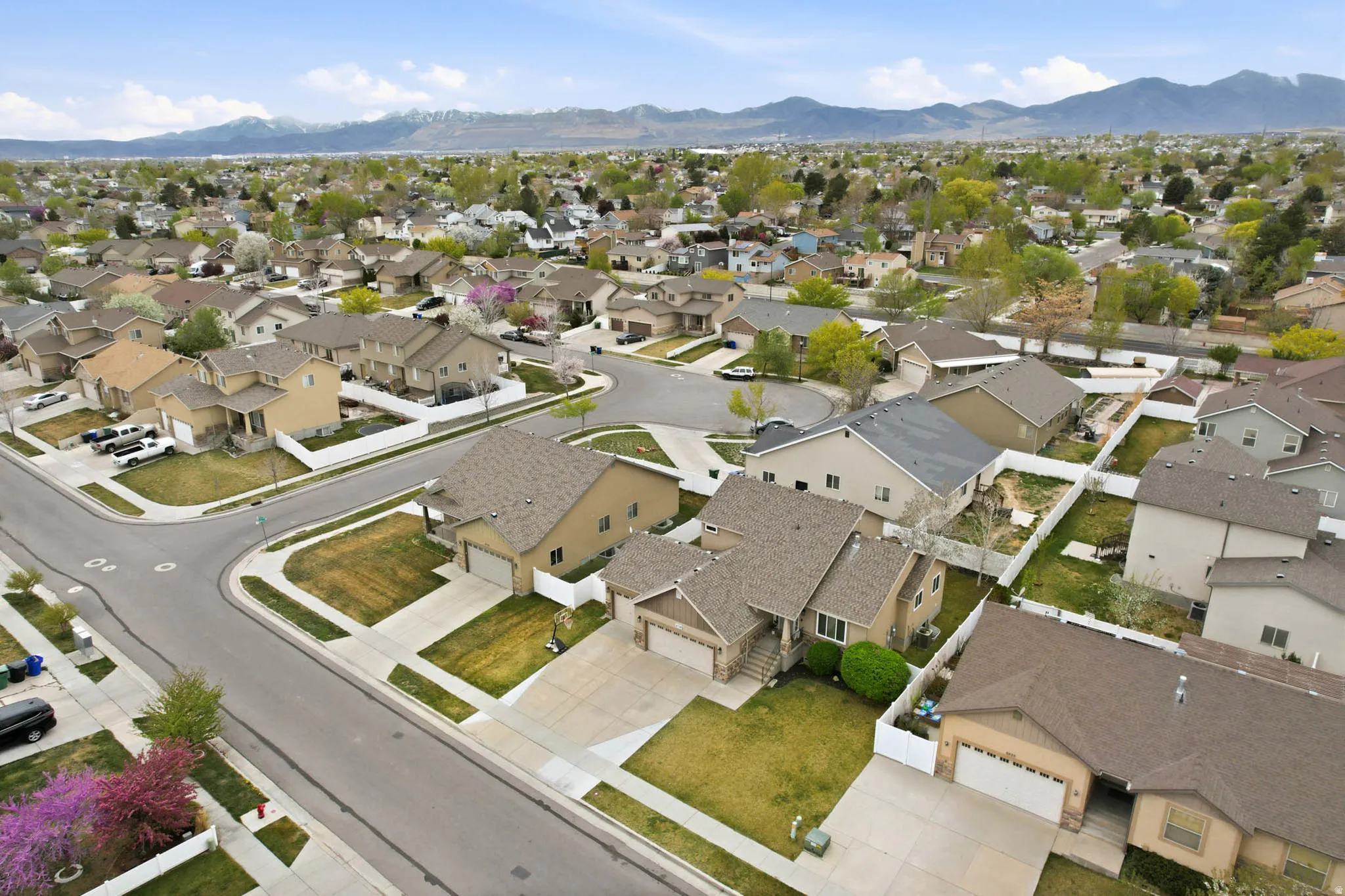 View of property location featuring a mountain backdrop and nearby suburban area