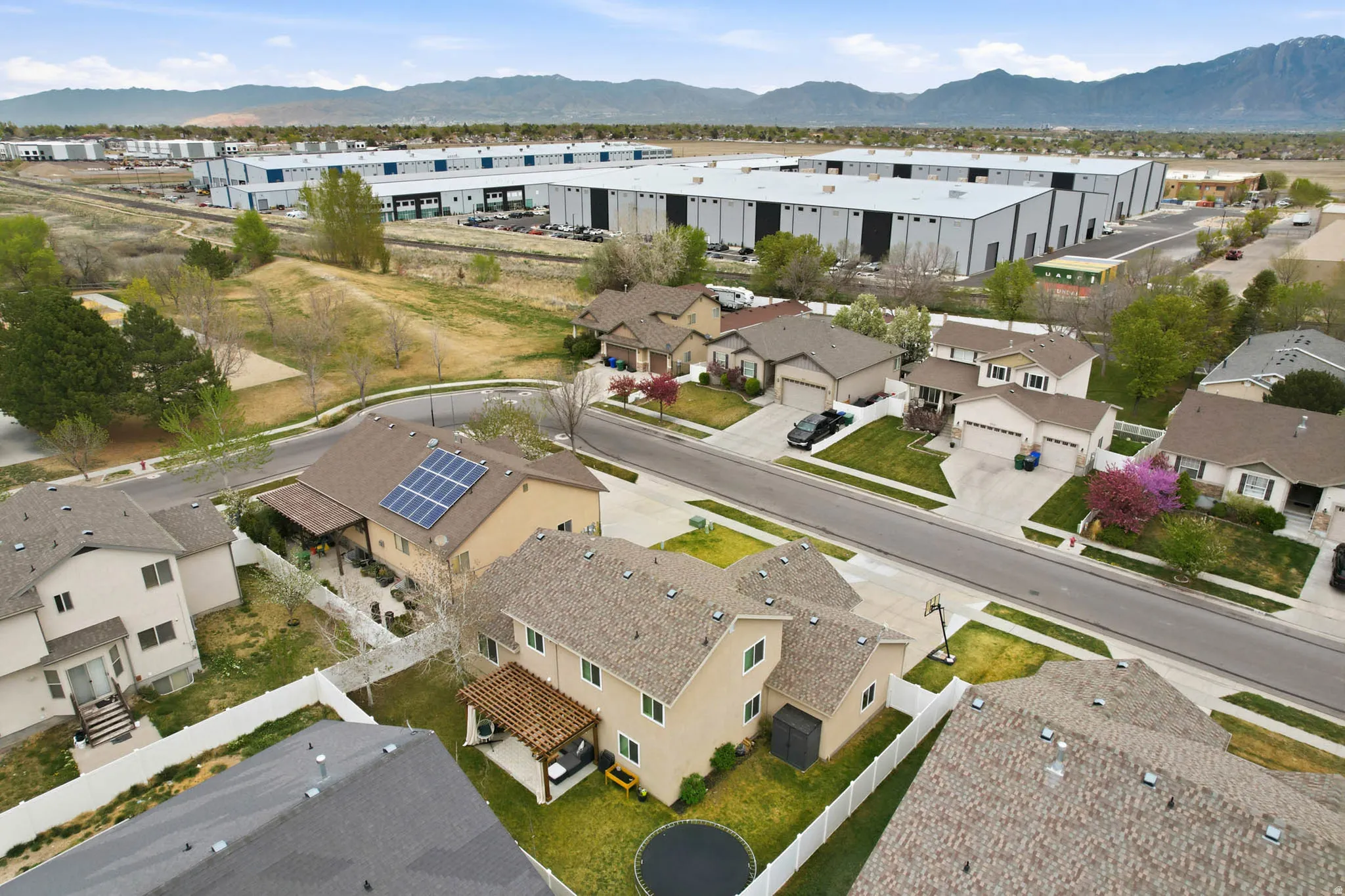 View of property location featuring a mountainous background and nearby suburban area