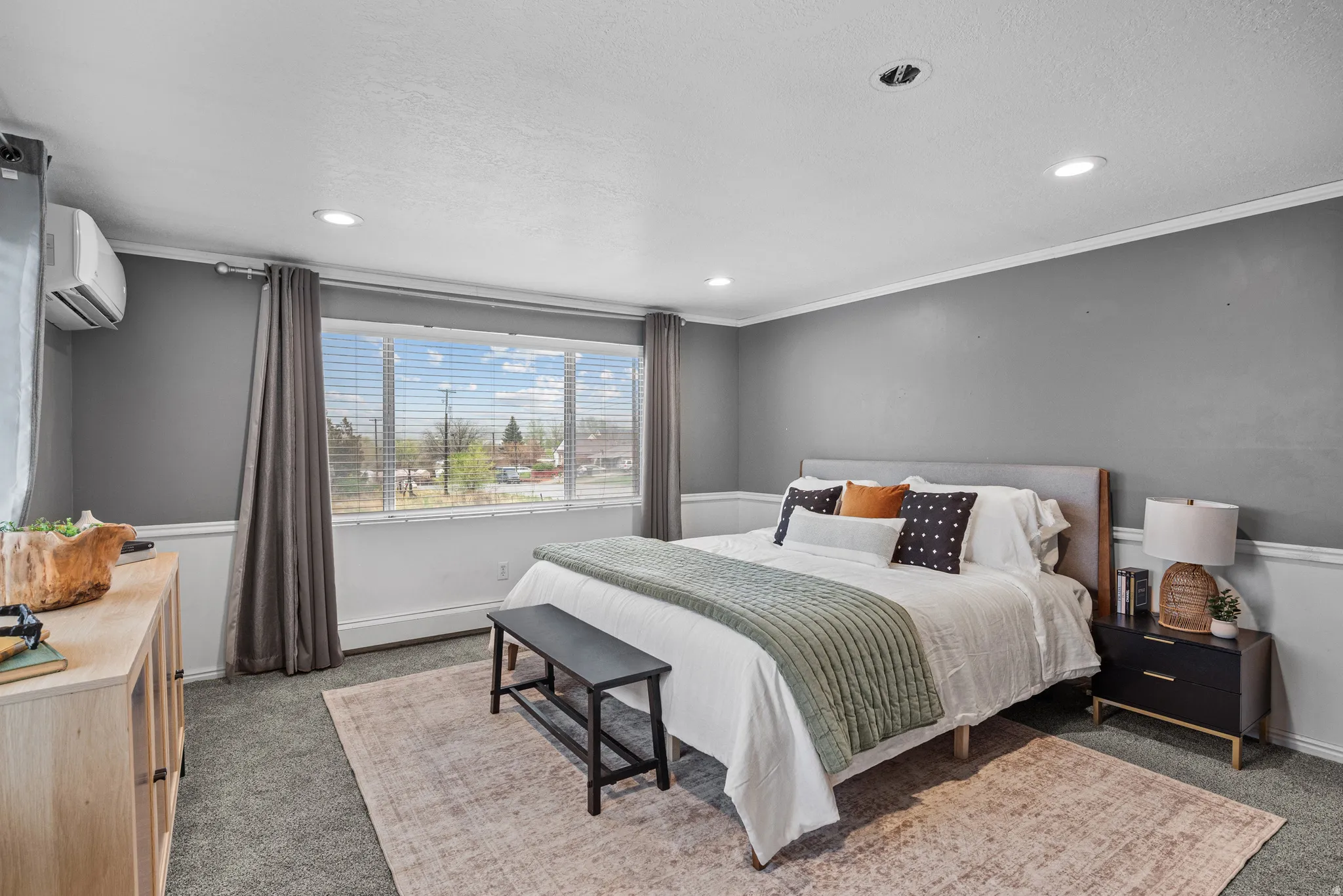 Bedroom with carpet, recessed lighting, and ornamental molding