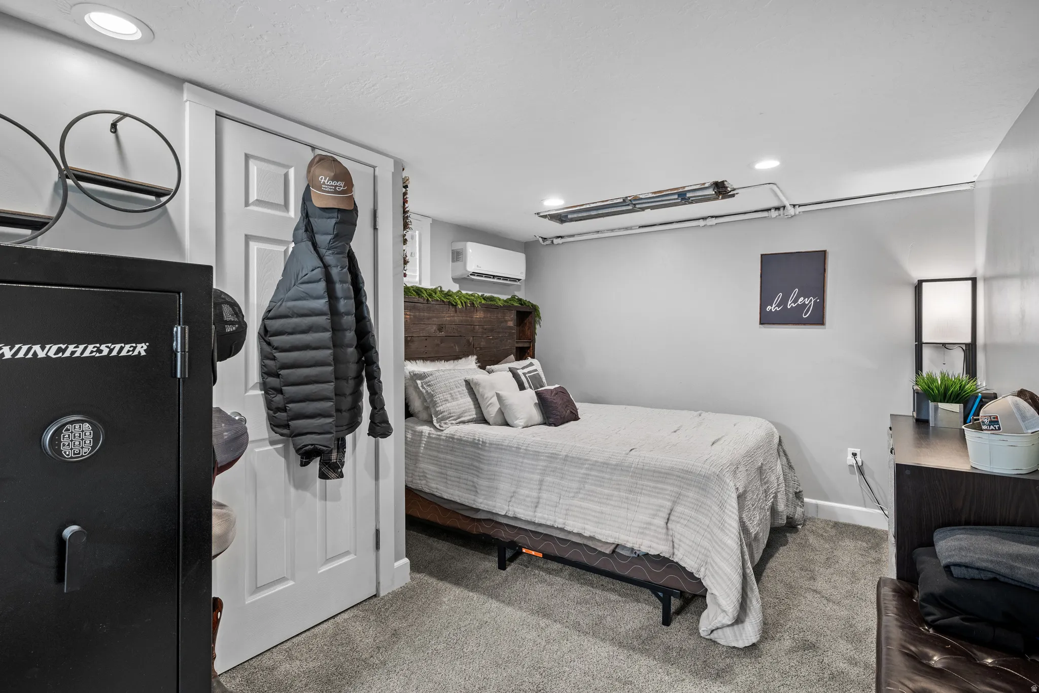 Bedroom featuring light carpet and recessed lighting
