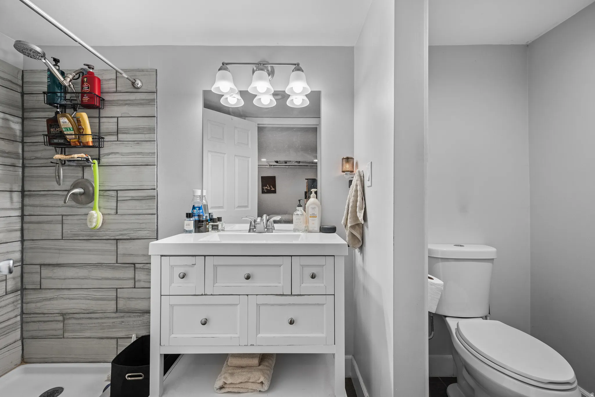 Full bathroom with a stall shower and vanity