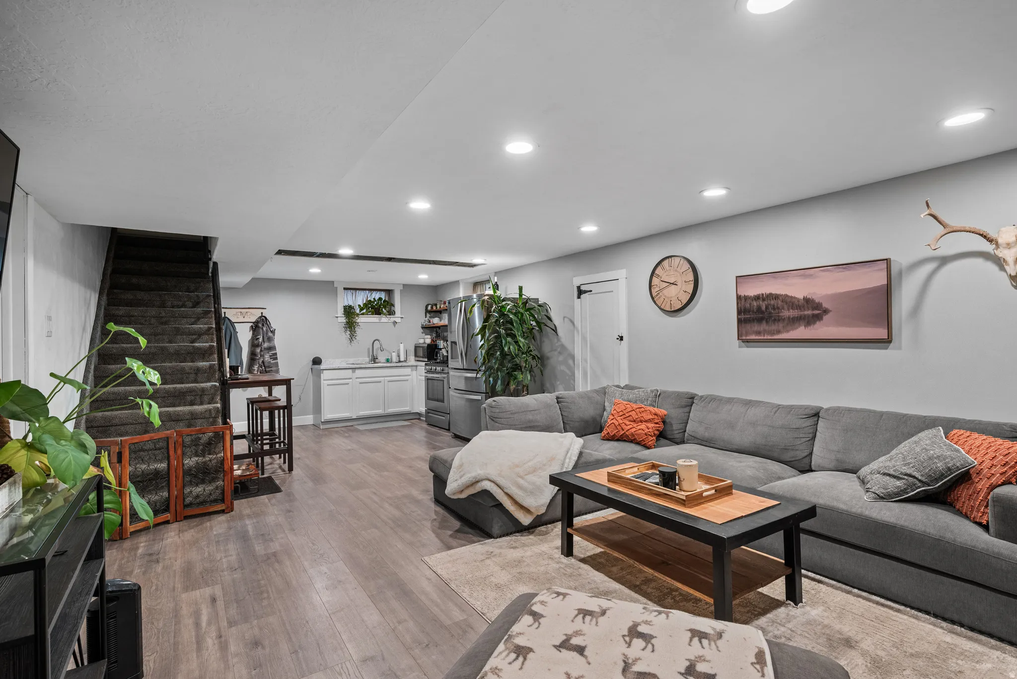 Living area featuring recessed lighting and light wood-style floors