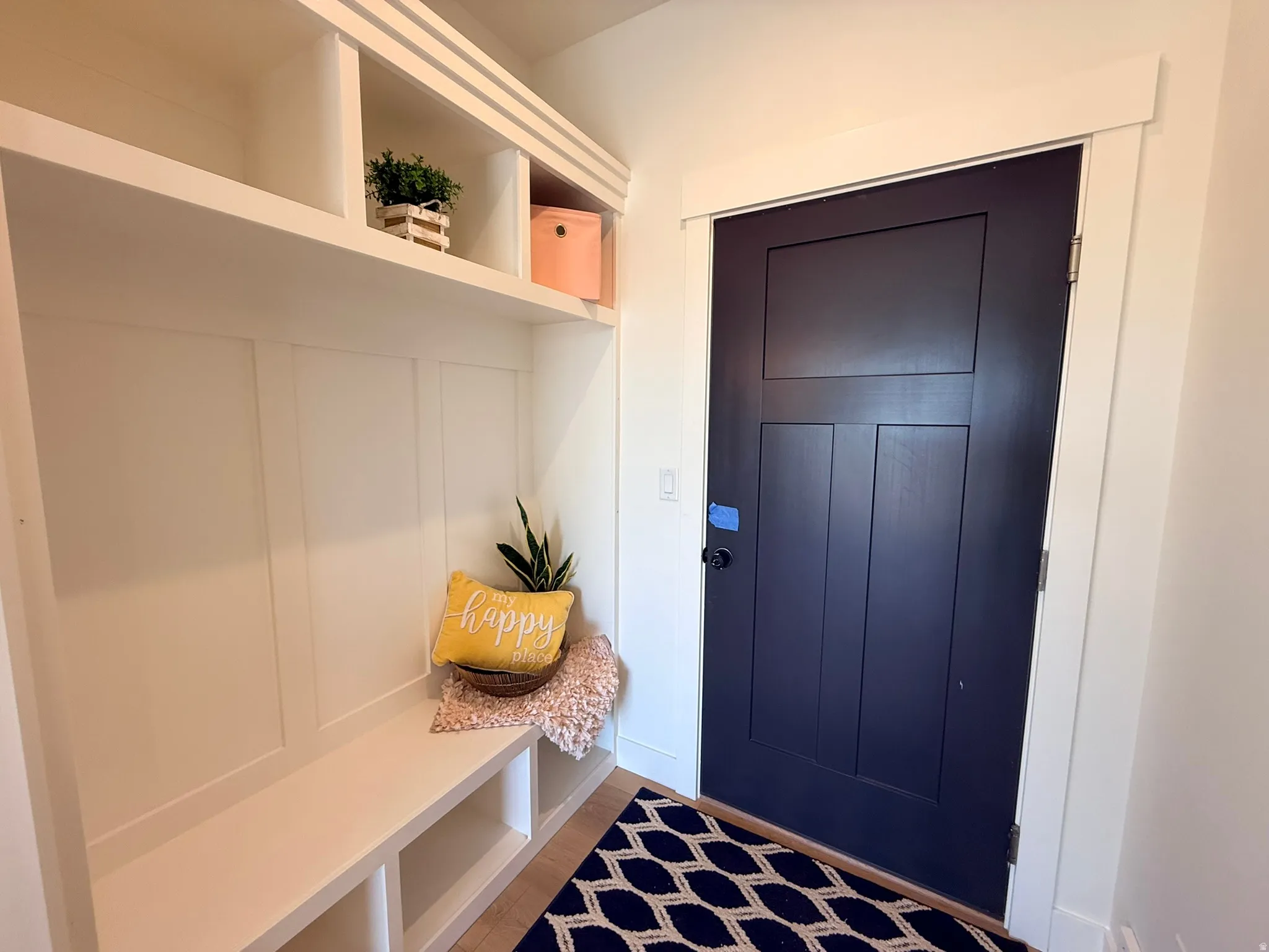 Mudroom featuring dark wood-type flooring