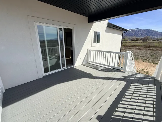 Wooden deck featuring a mountain view