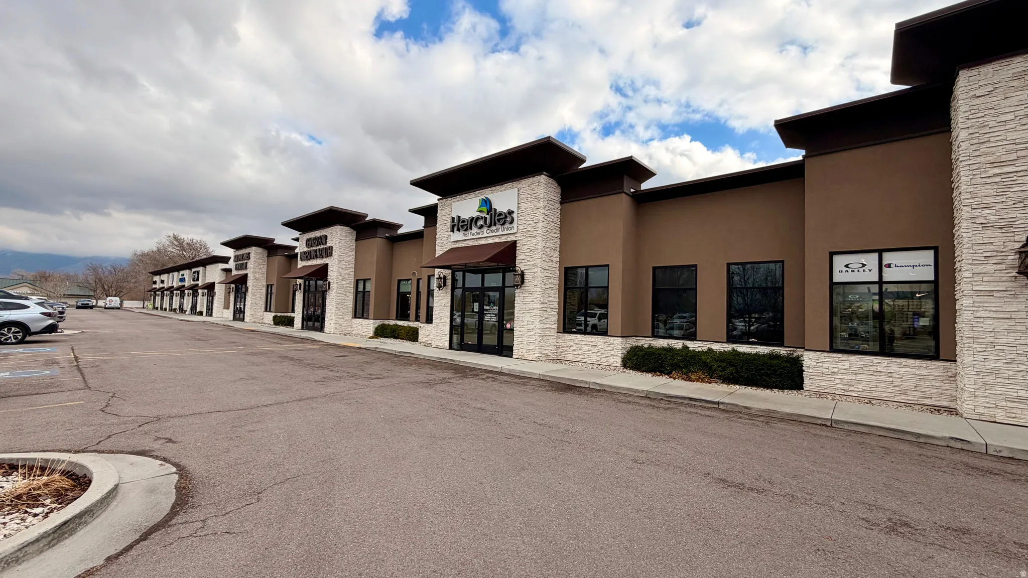 View of commercial location with uncovered parking