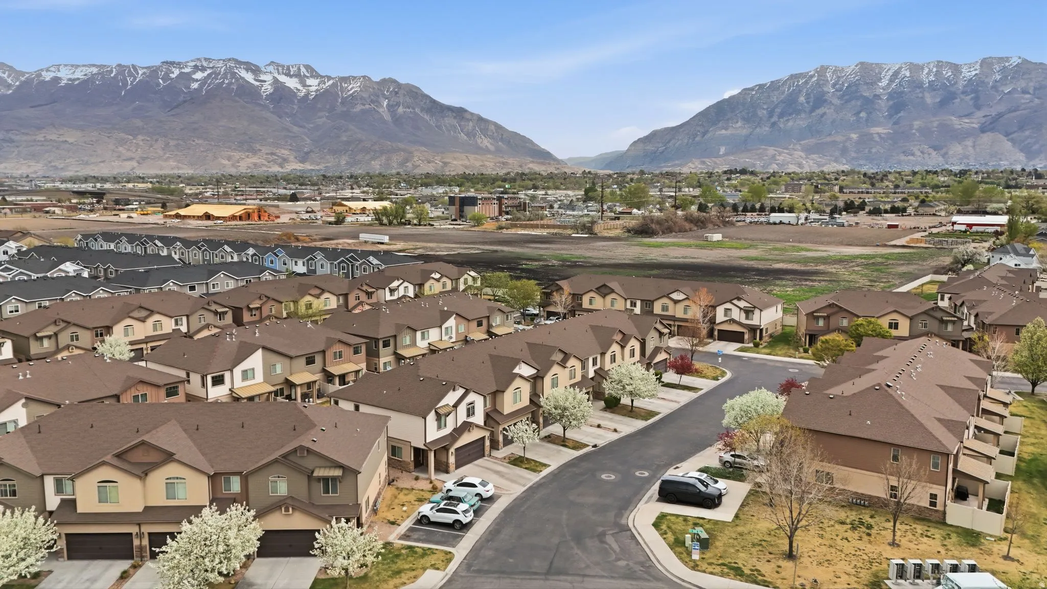 Aerial perspective of suburban area with mountains