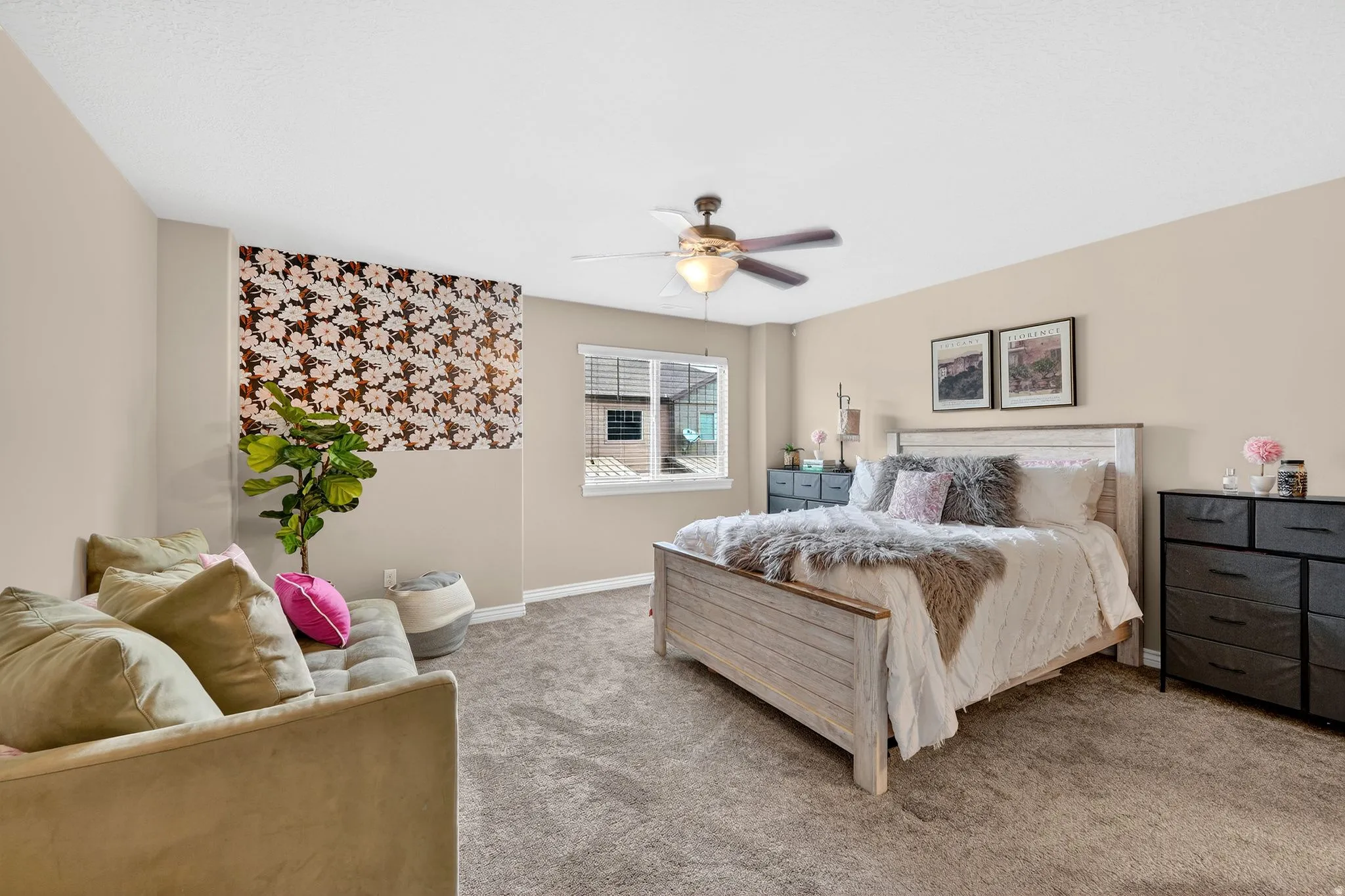 Bedroom with carpet floors and a ceiling fan