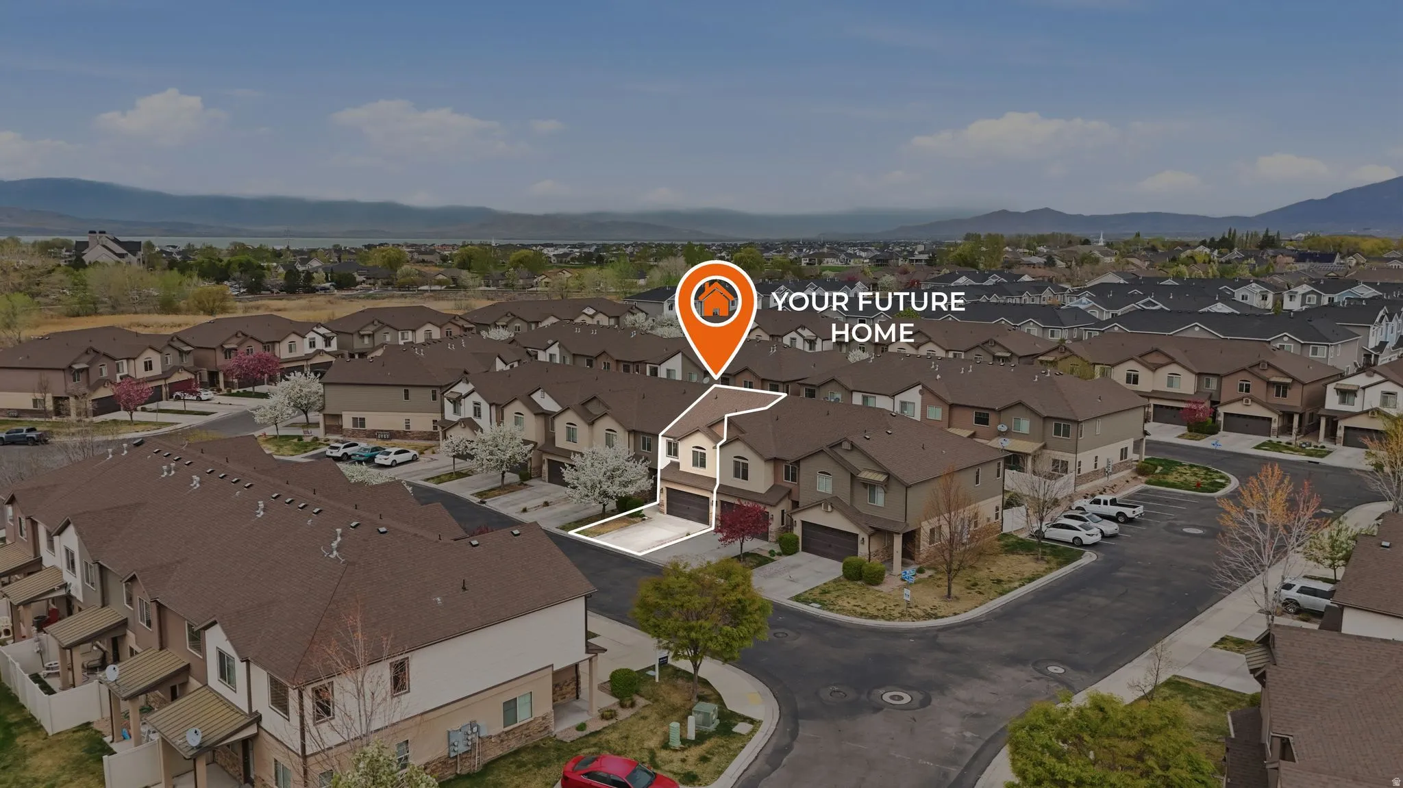 Aerial perspective of suburban area featuring mountains