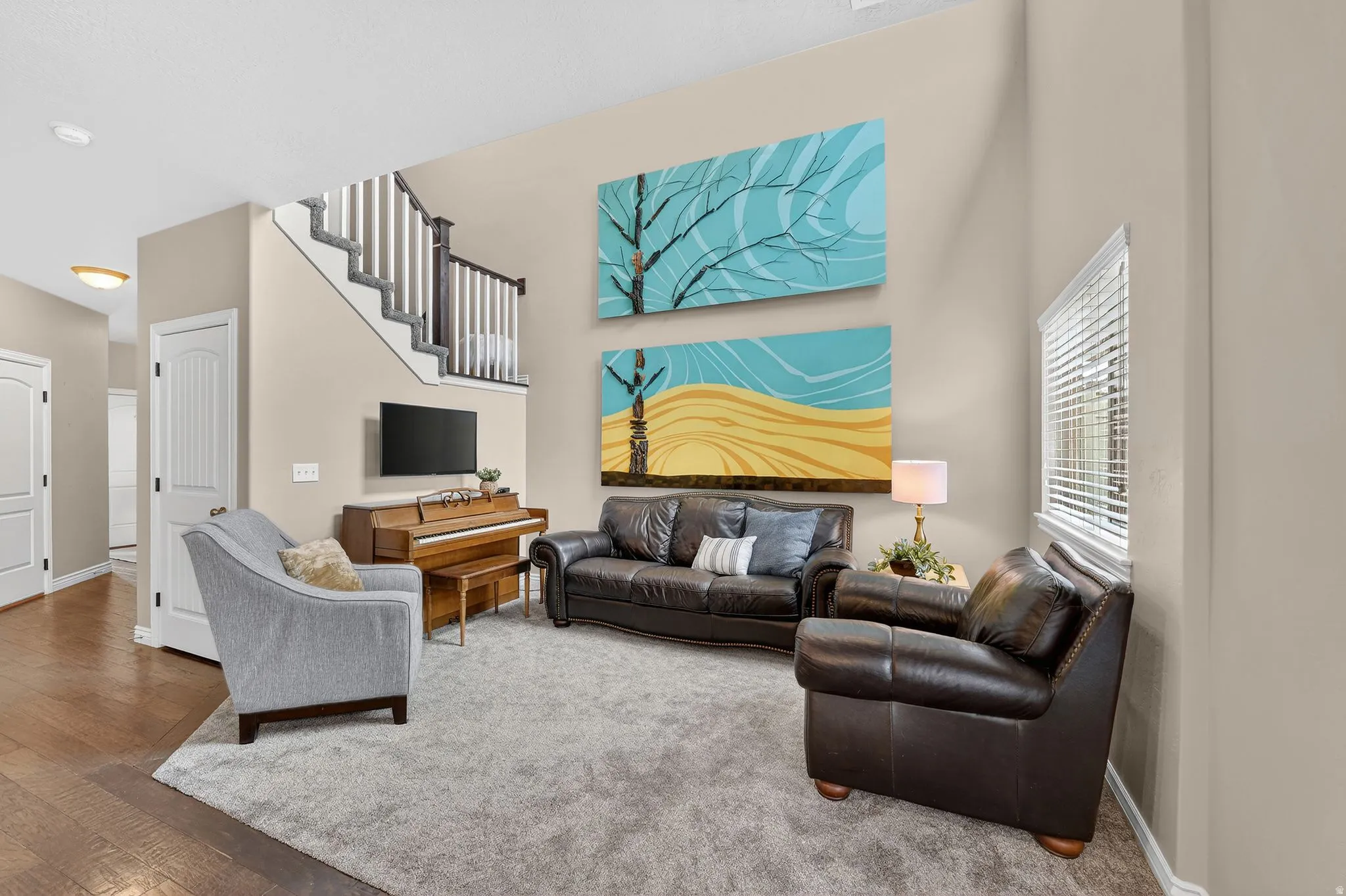 Living room with baseboards and wood finished floors