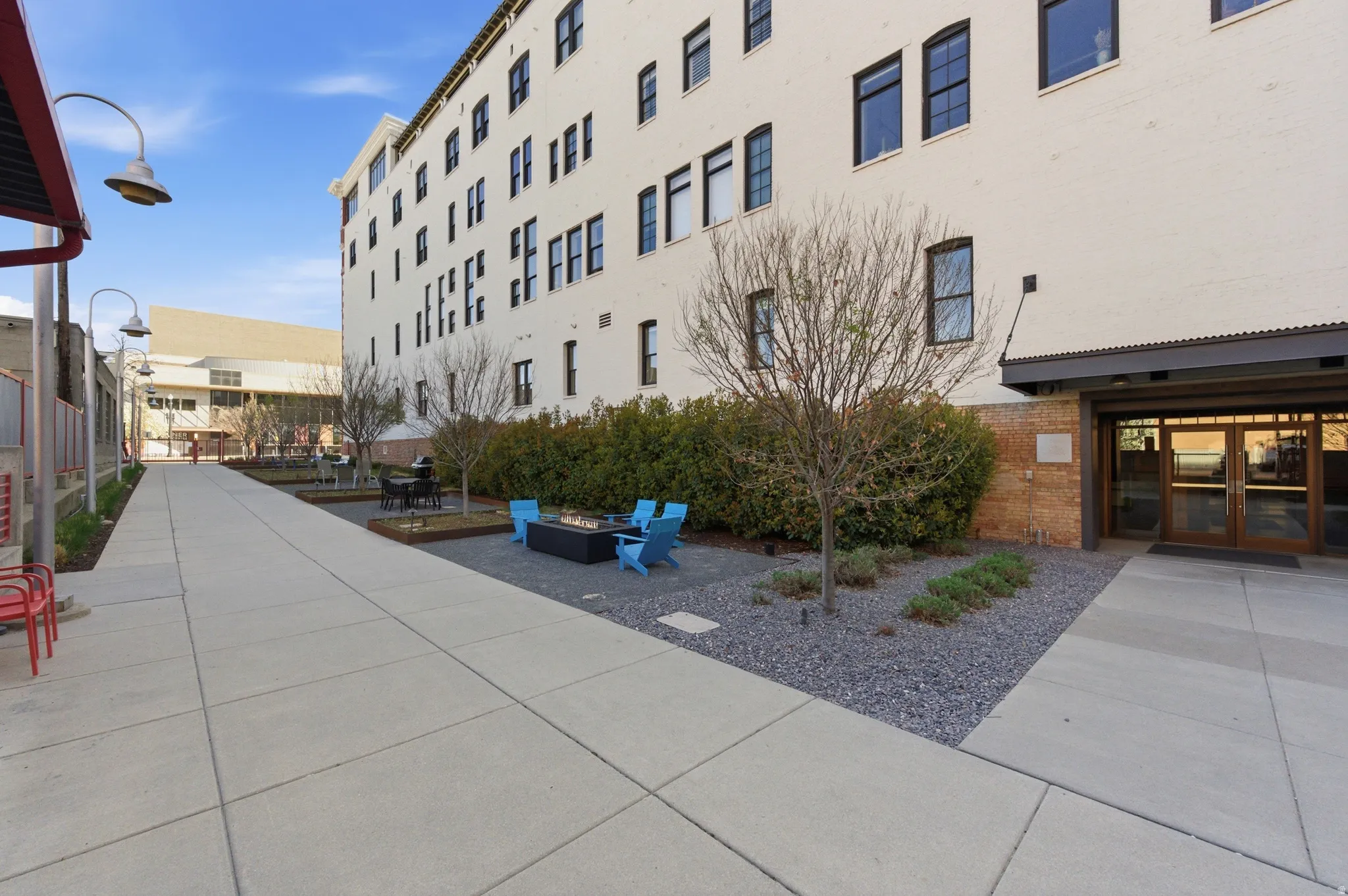 View of apartment building / complex with an outdoor fire pit