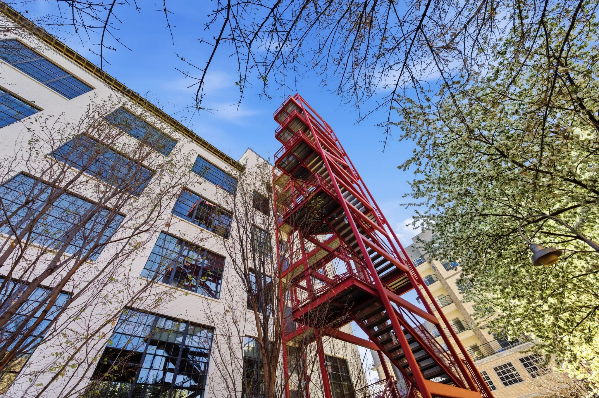 View of property featuring stairs