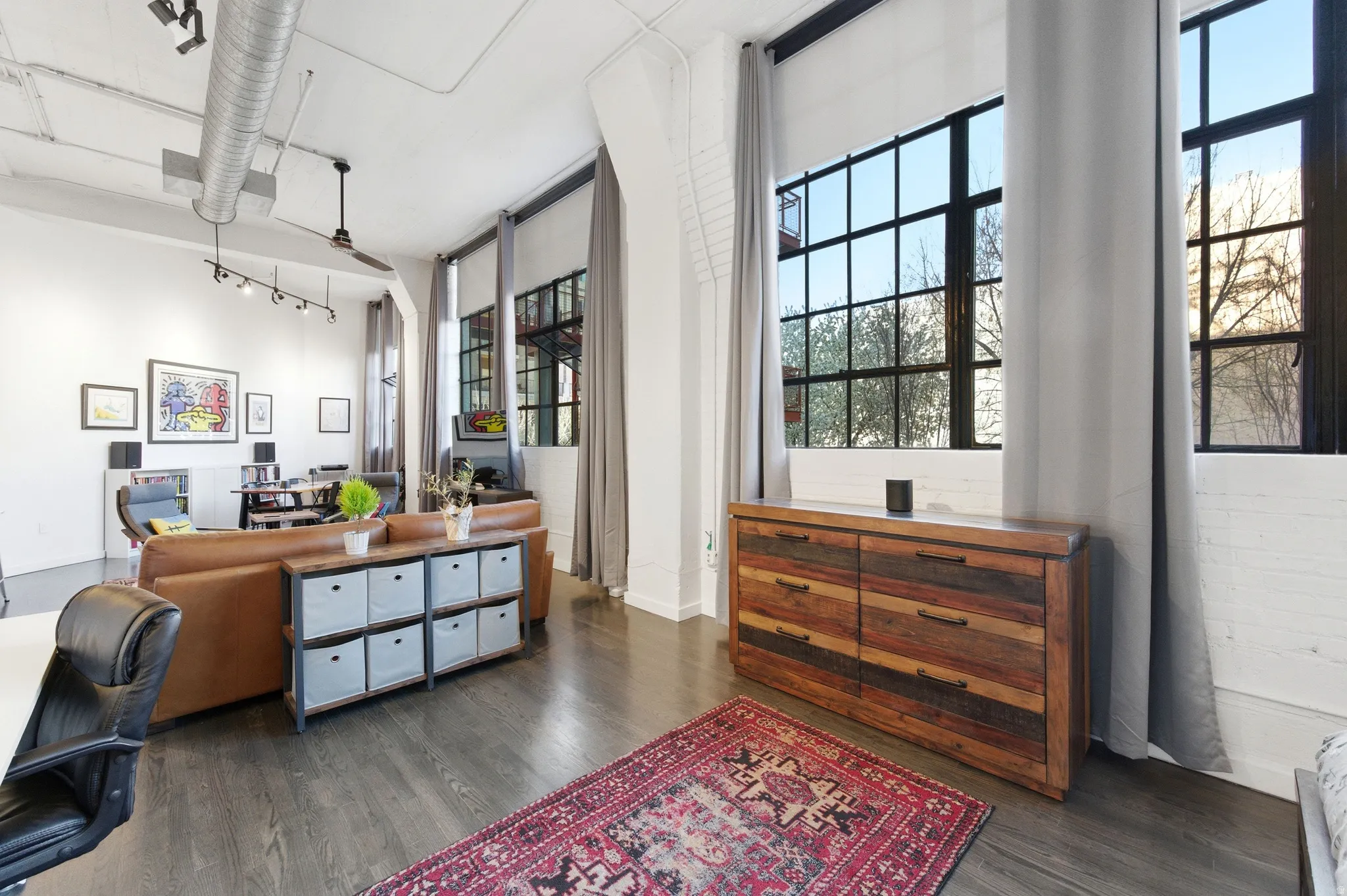 Office featuring dark wood-style flooring