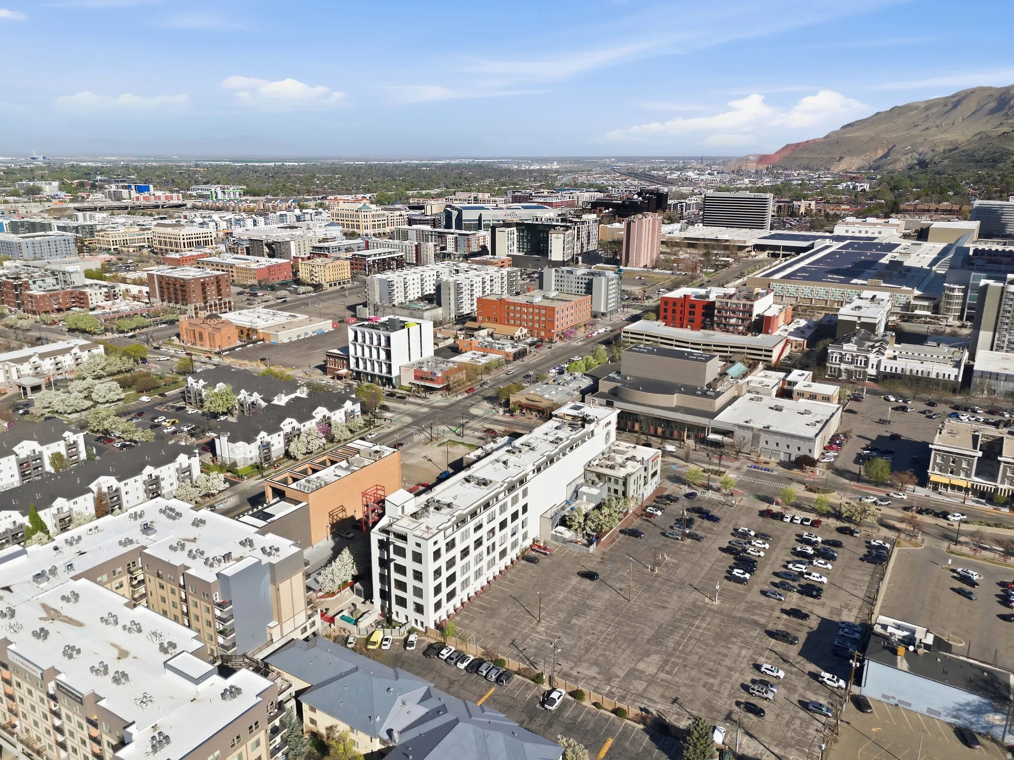 View of property location with nearby urban area