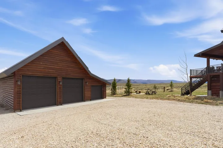 Detached garage with a mountain view