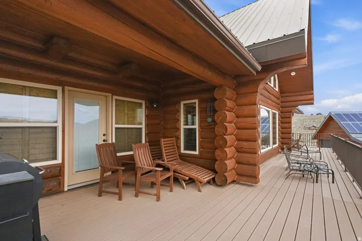 Wooden terrace featuring outdoor dining space