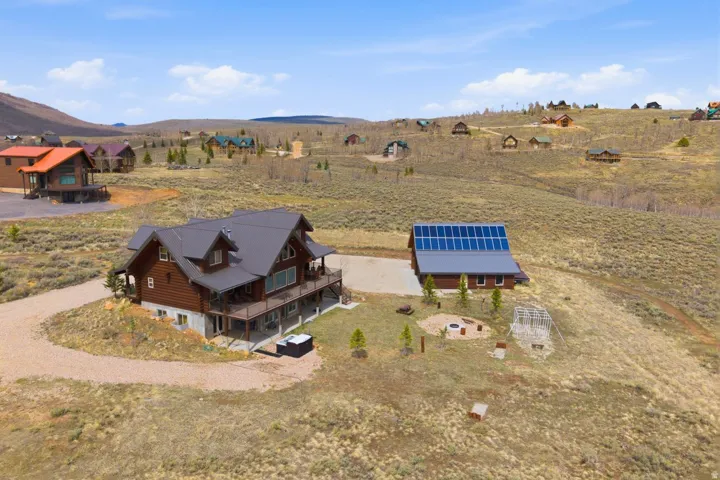 Overview of rural landscape featuring a mountain backdrop