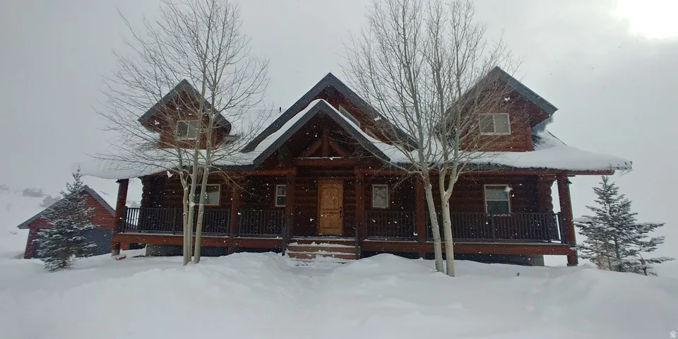 View of front of property with covered porch
