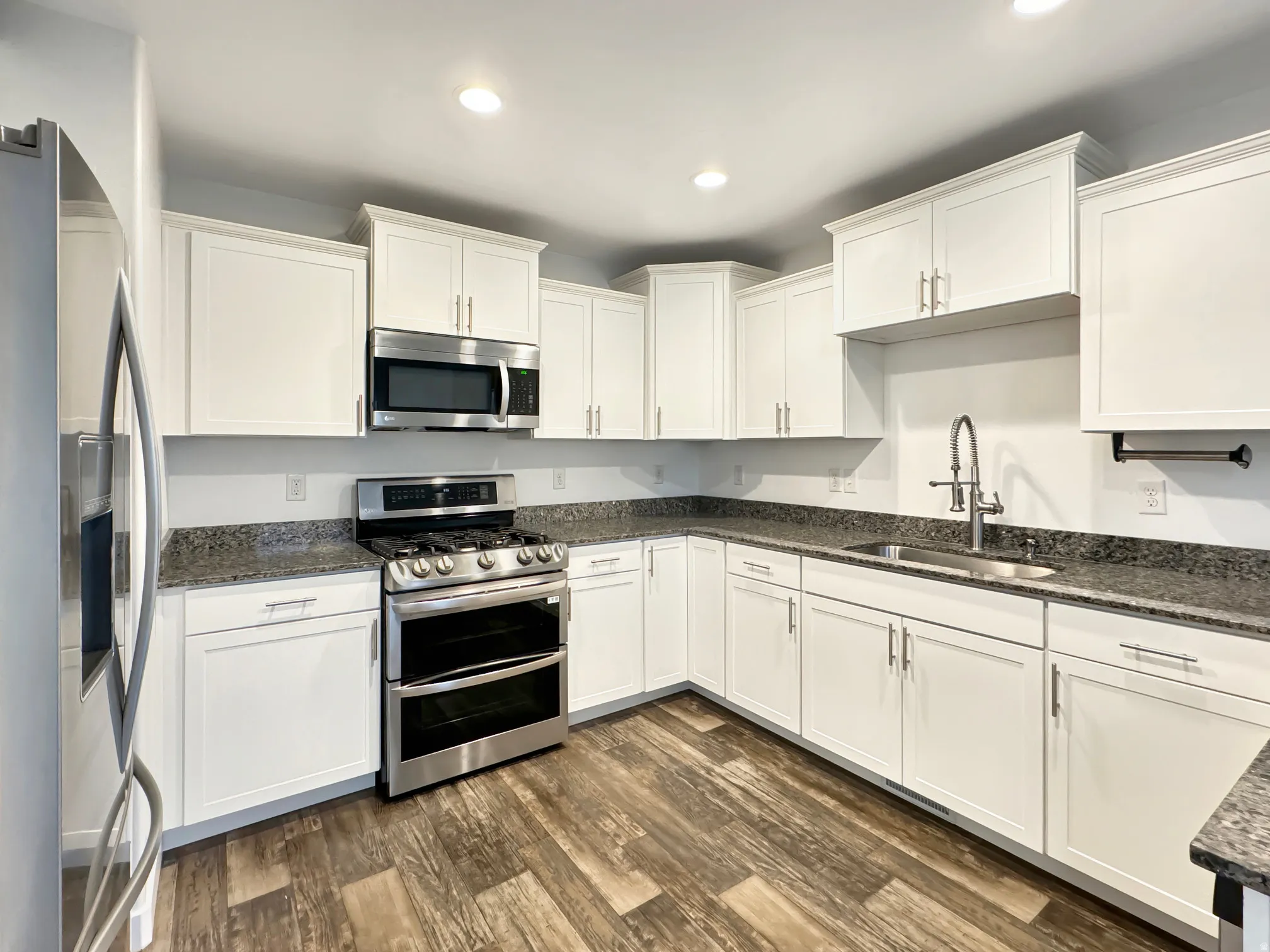 Kitchen with stainless steel appliances.