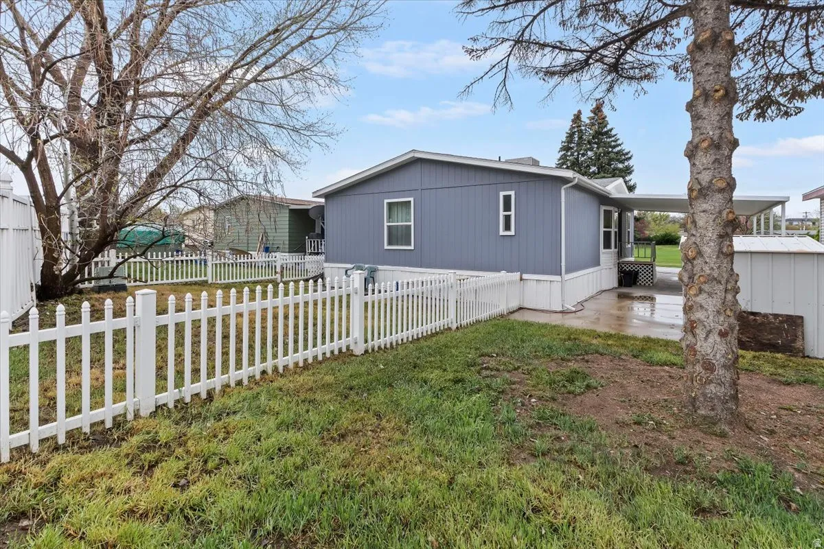 View of home's exterior with a patio area