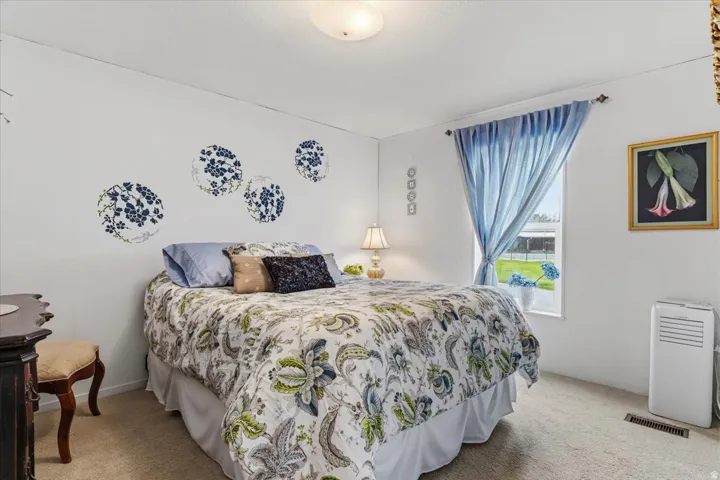 Bedroom featuring carpet
