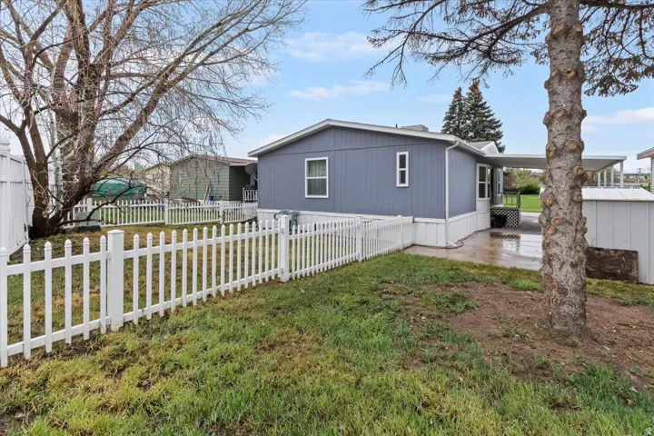View of home's exterior with a patio area