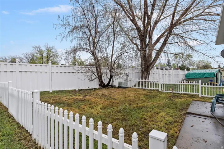 View of fenced backyard