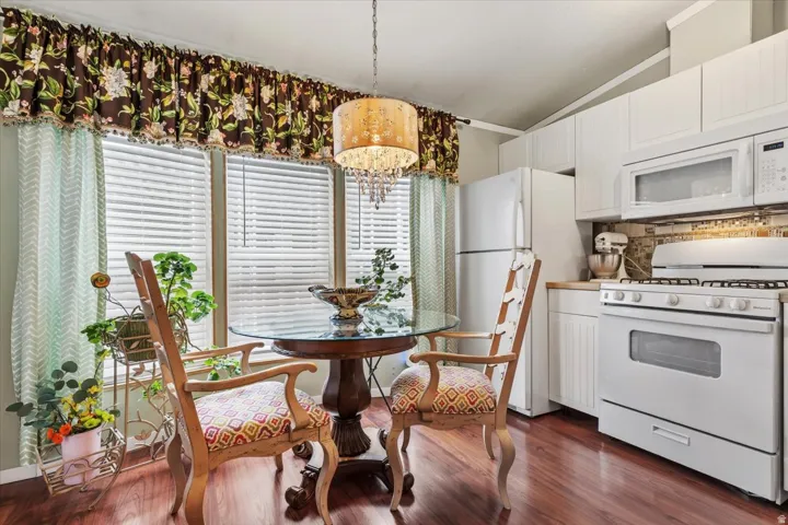 Dining area featuring LVP flooring and beautiful BAY window