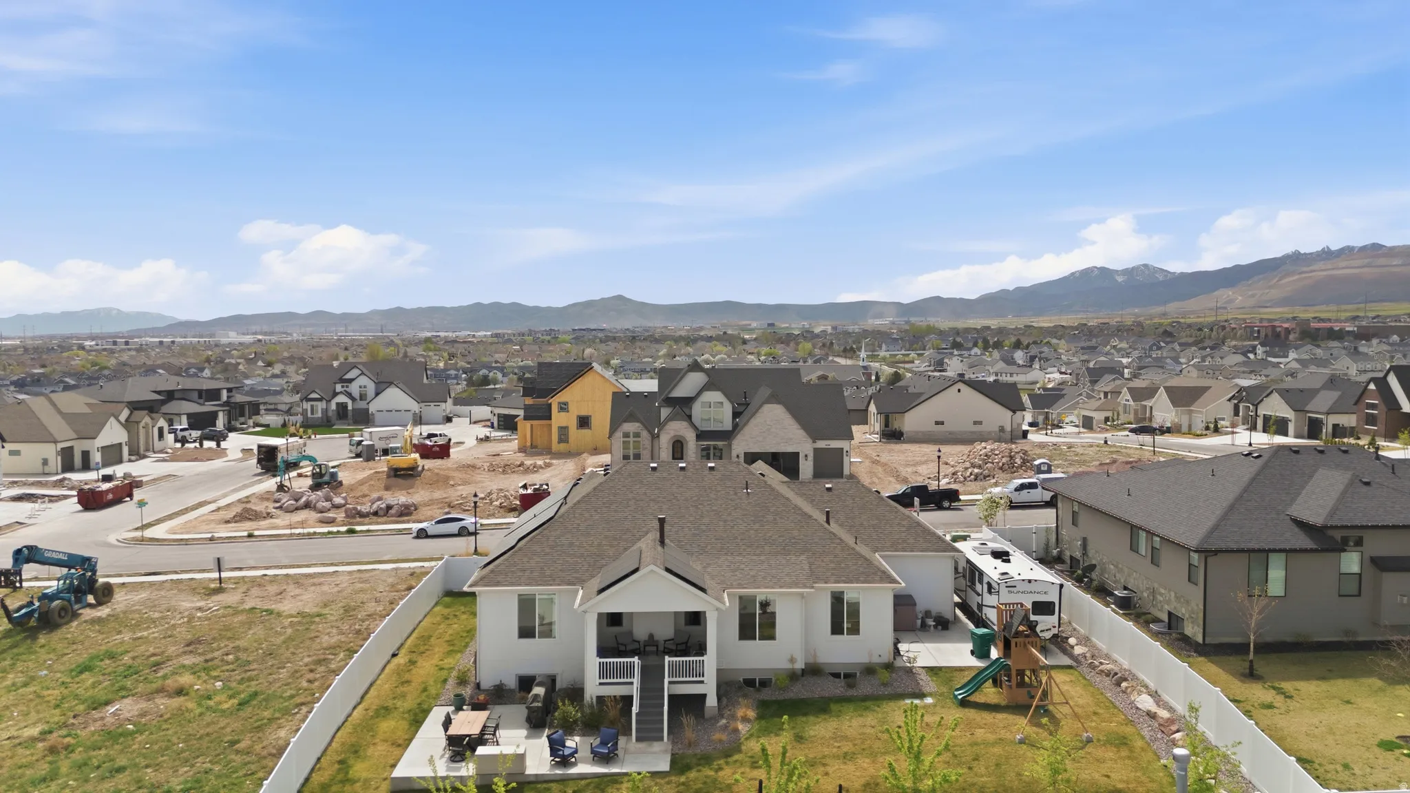 Aerial view of residential area with mountains
