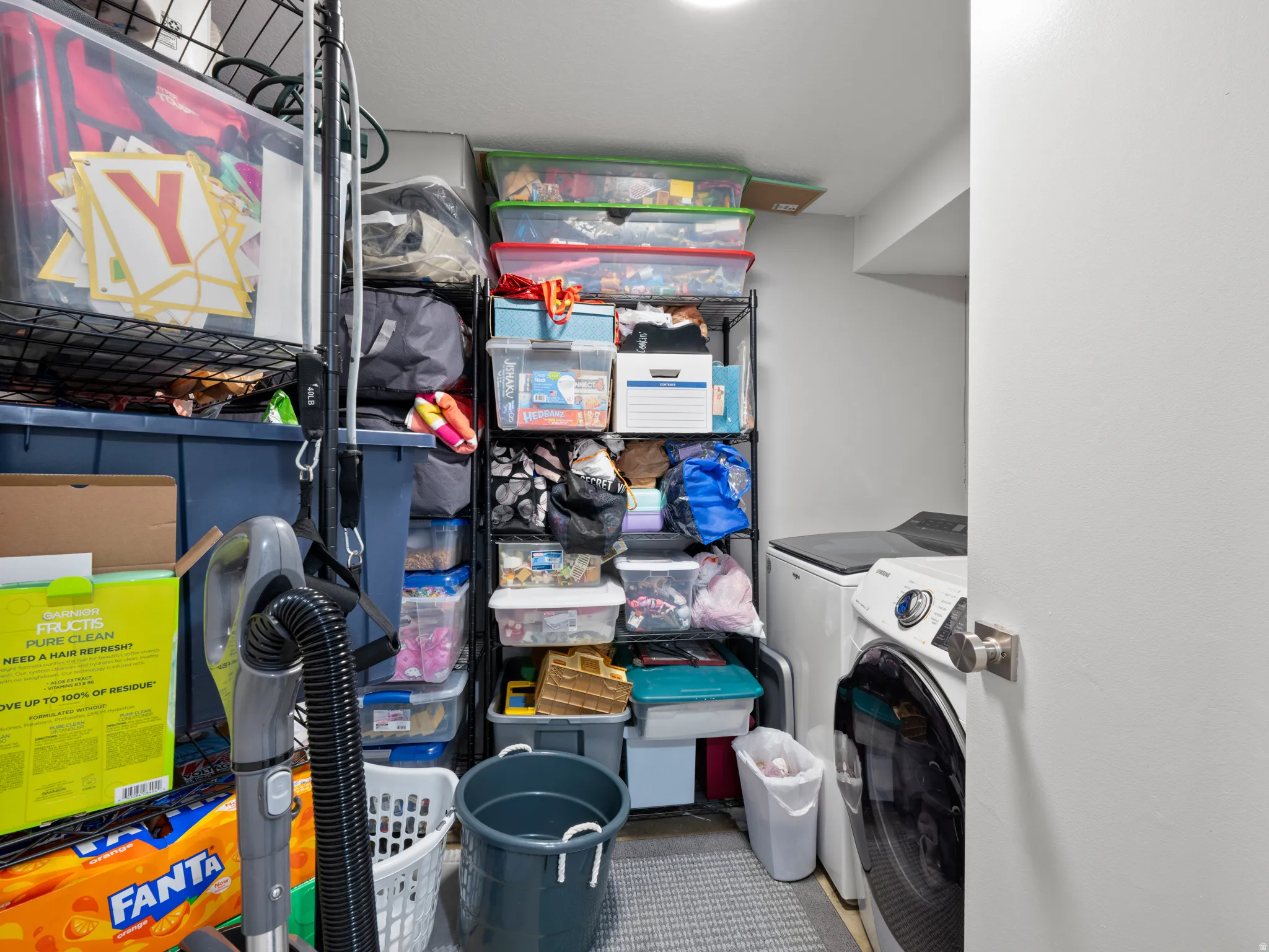 Laundry room featuring separate washer and dryer